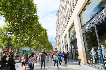 PARIS, FRANCE - February 20: The Champs-Elysees, on February 20, 2015 in Paris, France. Tourists stroll at The most famous avenue of Paris has 1910m and is full of stores, cafes and restaurantsのeditorial素材