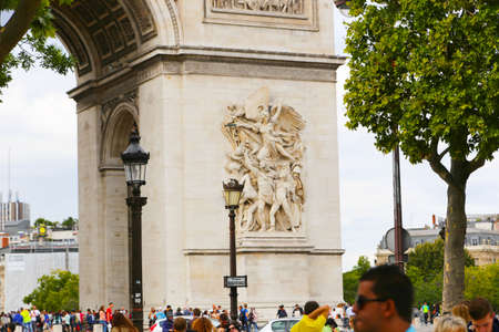 PARIS, FRANCE - February 20: The Champs-Elysees and the Arc de Triomphe, on February 20, 2015 in Paris, France. Tourists stroll at The most famous avenue of Paris has 1910m and is full of stores, cafes and restaurantsのeditorial素材