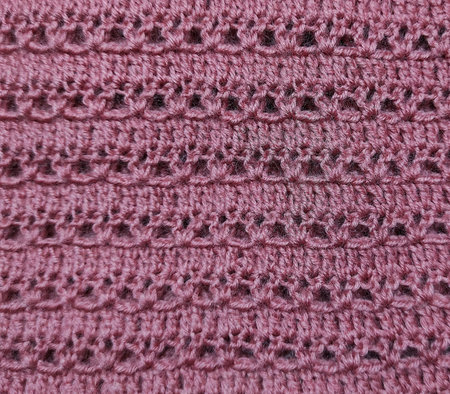 texture of natural cotton fabric of pomegranate color