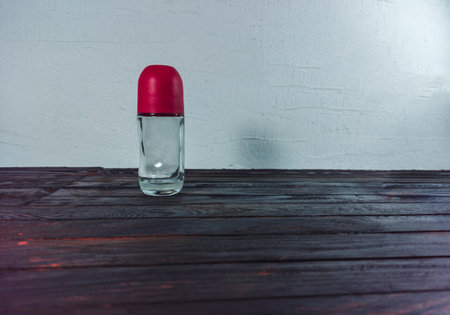 glass transparent bottle, antipresperant on a black backgroundの写真素材