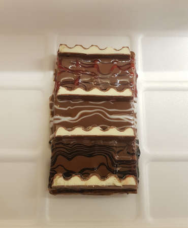 piece of waffle covered with creamy sweet sousesの写真素材