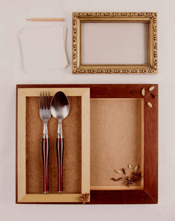 Black frame border with note paper for recipe ingredients. Top view