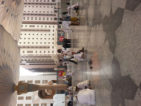 MADINAH, SAUDI ARABIA - AUGUST 18, 2015: Muslim pilgrims at Masjid An-Nabawi also known as the Prophet Mosque is second holiest site in Islam.のeditorial素材