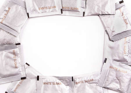 Collection of white sugar packs. Copy space.の写真素材