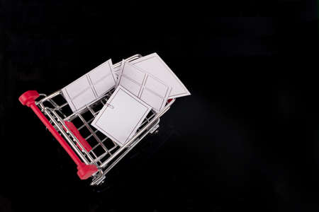 A trolley with paper window on a black background.の写真素材