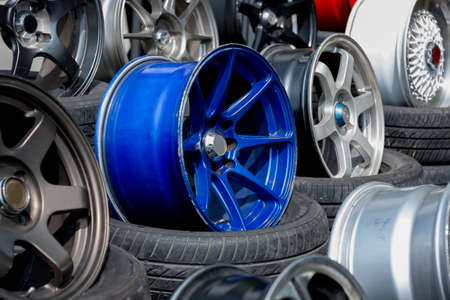 Car sport rims and tyres shown at tyre shop.の写真素材