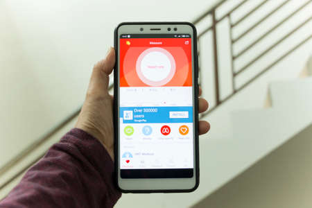 Negeri Sembilan, Malaysia - August 30, 2018: Health application on smartphone. It provides features to keep up your body fit and healthy. It also provides vision and hearing self examination.のeditorial素材