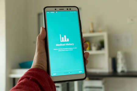 Negeri Sembilan, Malaysia - August 29, 2018: Healthcare application on smartphone. This application keeps record of medical history in one place.のeditorial素材