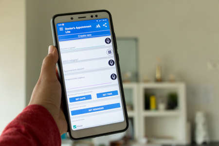 Negeri Sembilan, Malaysia - August 29, 2018: Doctor's Appointment application on smartphone. This application keeps record on doctor's appointment schedule.のeditorial素材
