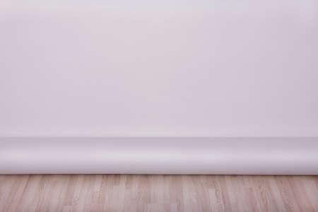 wooden floors and light background in studioの写真素材