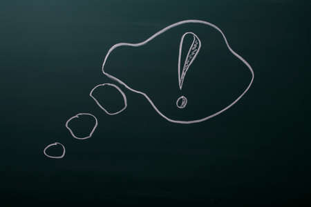 figure on the Board with a exclamation markの写真素材