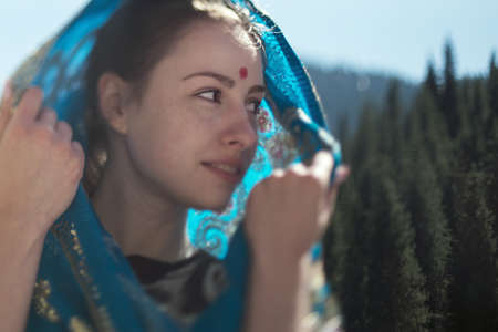 European girl in Sari outdoors