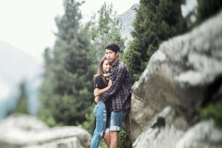 Young couple at the mountainsの写真素材