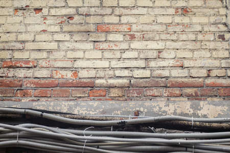 Texture brick wall with wiresの写真素材