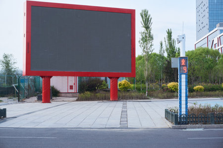 Traffic light and billboard on the street in Chinaの写真素材