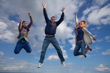group of guys are jumping