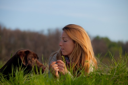 young woman and labrador dog の写真素材