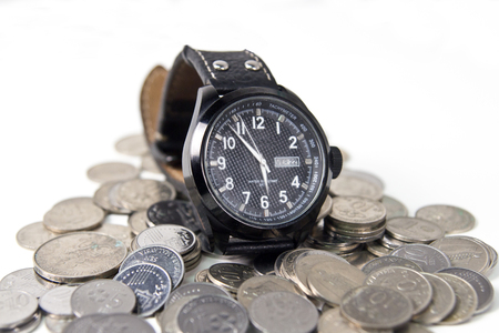 wrist watch with money isolatedの写真素材