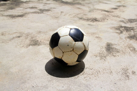 dirty ball on the streetの写真素材