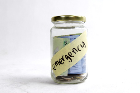 money in the jar for emergencyの写真素材