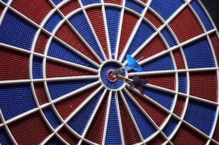 center of the target dartboard and two arrowsの写真素材