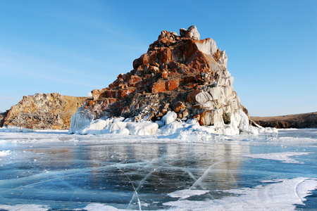Shaman Rock on Lake Baikal on a bright cold day in Marchの写真素材