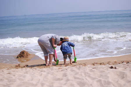 playing on beachの写真素材