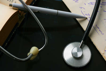 Medical records with x-ray and stethoscopeの写真素材