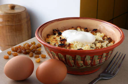 Bowl of pudding at a lay eggs and raisinsの写真素材