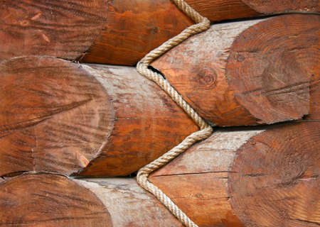 Wall of wooden house. Construction details of the log house.の写真素材