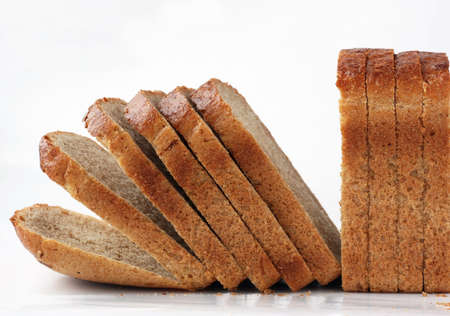 Loaf of sliced bread on a white background