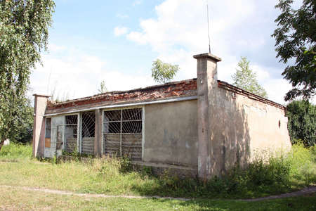 Single-storey derelict building with broken windowsのeditorial素材