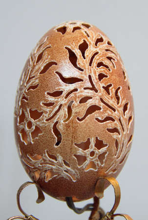 LUTSK - APRIL 14, 2014: Beautifully carved eggs in a museum. Shallow depth of field.のeditorial素材