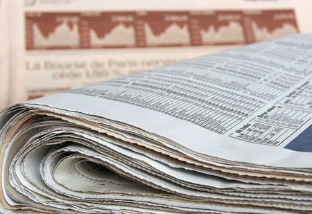Business newspapers. Shallow depth of field. Focus on the foreground.の写真素材