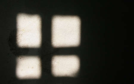 Light from a window in a dark corridor