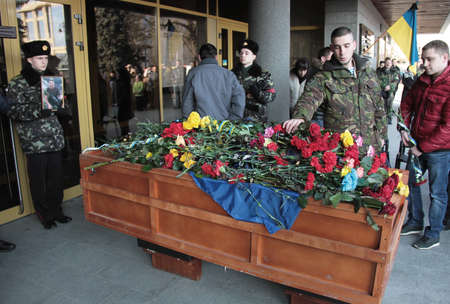 LUTSK, UKRAINE - January 15, 2015: memorial service at Cathedral on three Ukrainian army soldiers who were killed by separatists in checkpoint near the town Ilovayskのeditorial素材