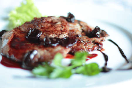 Grilled steak and vegetables. Shallow depth of field.の写真素材