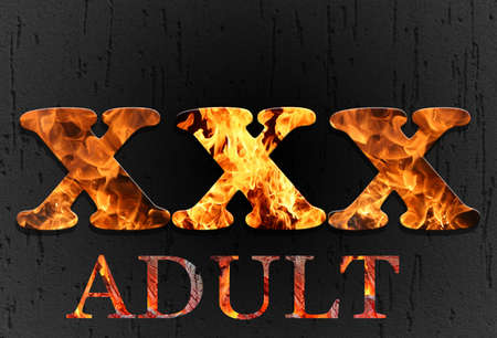 XXX flames on dark backgroundの写真素材