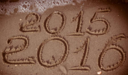 Happy New Year 2016 replace 2015 concept on the sea beachの写真素材