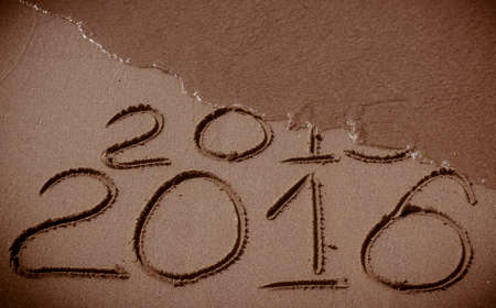 Happy New Year 2016 replace 2015 concept on the sea beachの写真素材