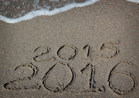 Happy New Year 2016 replace 2015 concept on the sea beachの写真素材