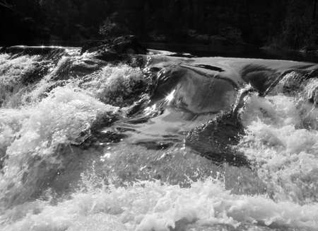 Threshold of the mountain river and wet stones