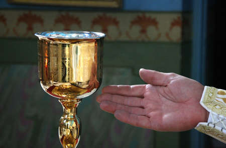 LUTSK, UKRAINE - NOVEMBER 02 - Hand of priest during orthodox liturgy ceremony in Lutsk on November 02, 2008.の写真素材