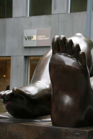 VADUZ, LIECHTENSTEIN - MAY 06: Fragment of bronze sculpture Reclining Woman (Ruhende Frau) by Colombian artist Fernando Botero located next to Art Museum (Kunstmuseum Liechtenstein) on May 06, 2009 in Vaduz.のeditorial素材