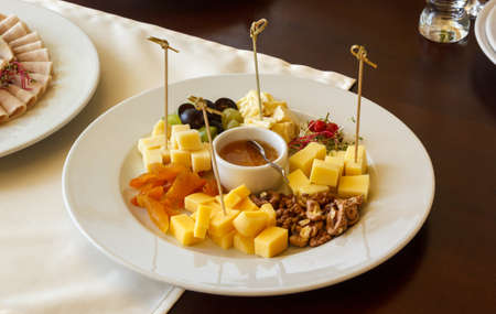 Cheese skewers with sauceの写真素材