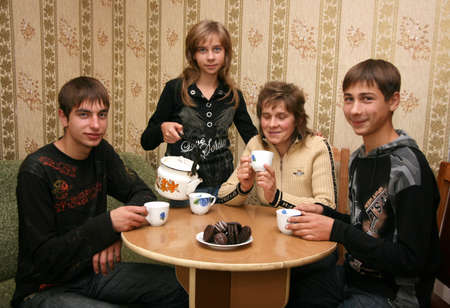 RIVNE, UKRAINE - 24 October 2008: Ukrainian family at breakfast in the roomのeditorial素材
