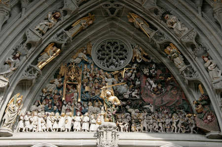 BERN, SWITZERLAND - May 03, 2009: Over the main portal of cathedral is one of the most complete Late Gothic sculpture collections in Europeのeditorial素材