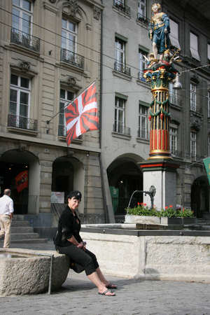 BERN, SWITZERLAND - 03 May 2009: Street view on Kramgasse with fountain in the old town. It is a popular shopping street and medieval city centerのeditorial素材