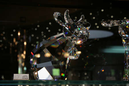 WATTENS, AUSTRIA - May 07, 2009: Cow made with crystal Swarovski at Crystal Worlds (Kristallwelten) museum. Swarovski is an Austrian producer of luxury cut lead glass found in 1895のeditorial素材