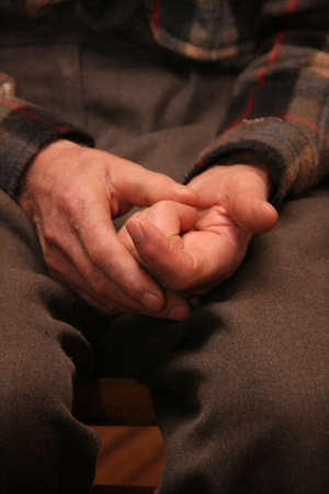 Senior man counting on fingers - hands gesture